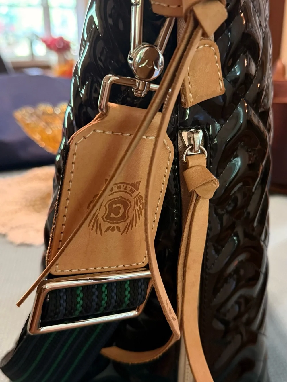 Consuela Inked Sling Black Quilted Patent Sling Tote with Tan Leather Trim